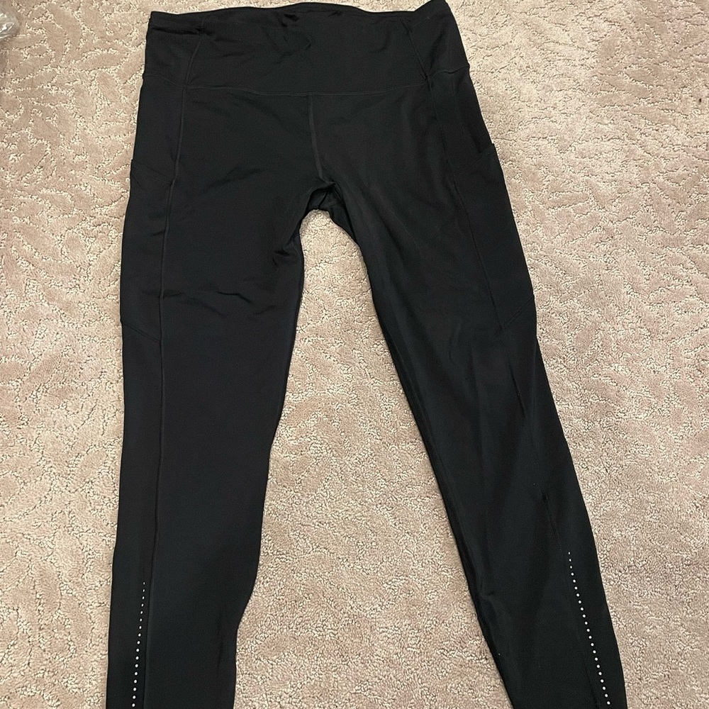 Lululemon leggings tights size 12 with pockets. Great condition!